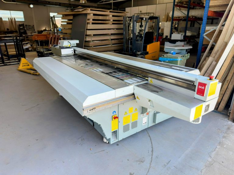 Transporte e instalación de impresora industrial Océ Arizona 318 GL en Madrid